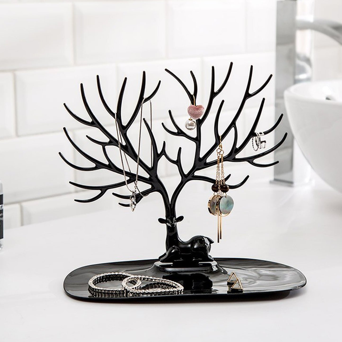 Deer-shaped jewellery holder side view India