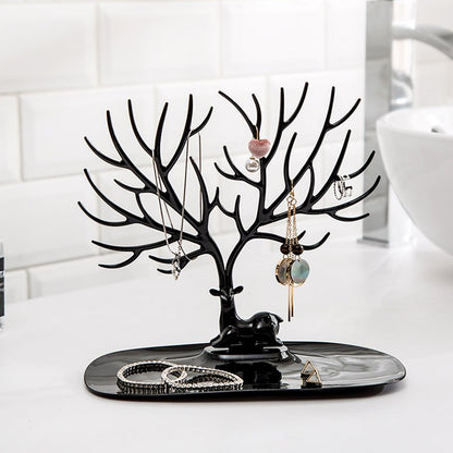 Deer-shaped jewellery holder side view India