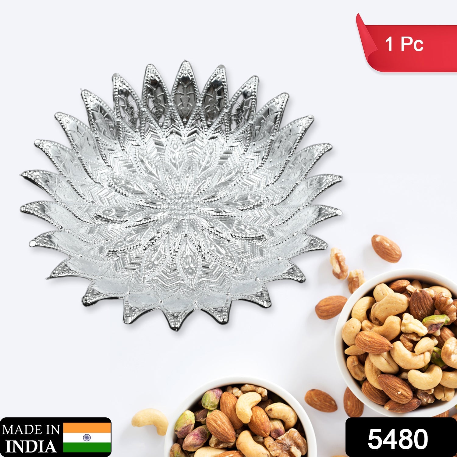 Traditional silver-finish plastic serving tray decorative design India
